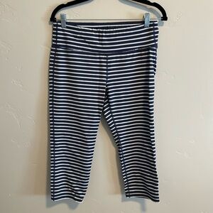 Athleta navy leggings with white stripes in size large
